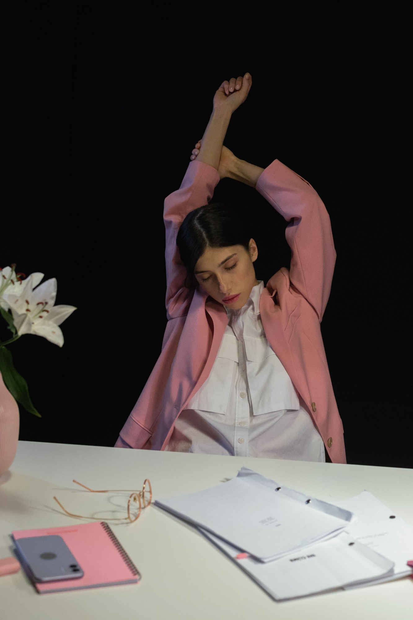 Stretching at a desk