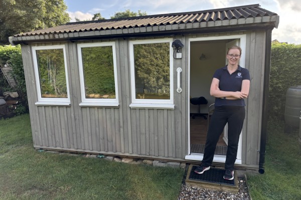 Hannah Tabram outside her Kenninghall massage therapy room
